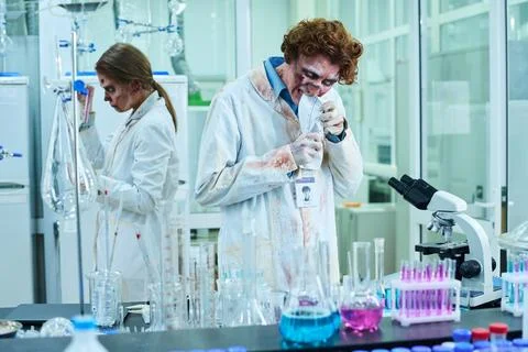 Clueless Living Corpse Technicians in Laboratory Stock Photos