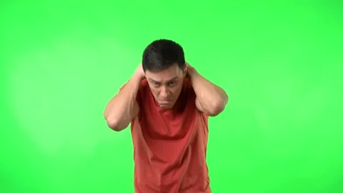 Clueless man trying on face mask wrong Stock Footage 171850305