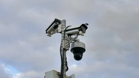 Cluster of CCTV Surveillance Cameras on a Pole Against an Overcast Sky Moscow 库存影片 339249028