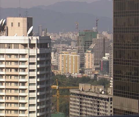 Cluster of high-rises in Beijing with construction crane Stock Footage 86745099