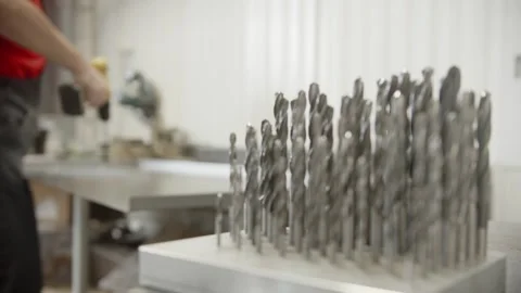 A Cluster of Metal Drillers on a Table, Capturing the Production of Parts on a Stock Footage 254972576