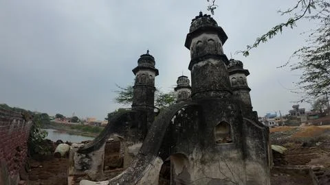 Cluster of Weathered Cylindrical Structure , Likely Historical Village Well Stock Photos