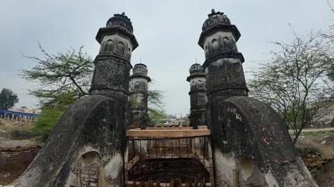 Cluster of Weathered Cylindrical Structure , Likely Historical Village Well Stock Photos