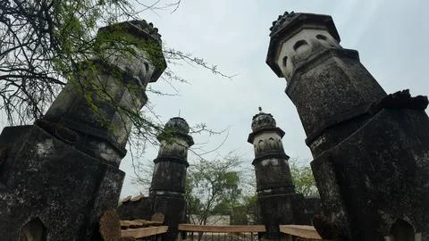 Cluster of Weathered Cylindrical Structure , Likely Historical Village Well Stock Photos