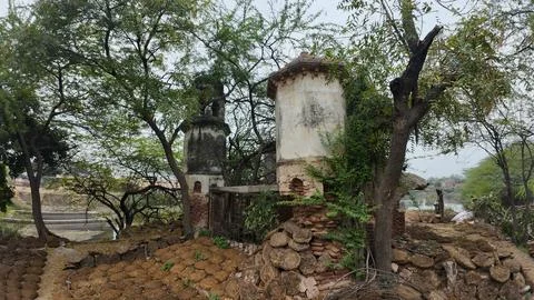 Cluster of Weathered Cylindrical Structure , Likely Historical Village Well Stock Photos