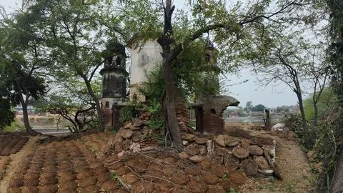 Cluster of Weathered Cylindrical Structure , Likely Historical Village Well Stock Photos