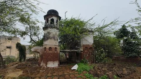 Cluster of Weathered Cylindrical Structure , Likely Historical Village Well Stock Photos