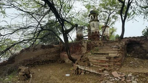 Cluster of Weathered Cylindrical Structure , Likely Historical Village Well Stock Photos