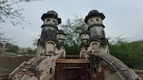 Cluster of Weathered Cylindrical Structure , Likely Historical Village Well Stock Photos