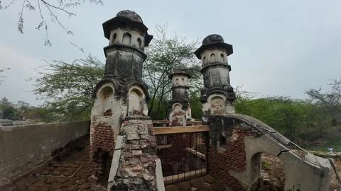 Cluster of Weathered Cylindrical Structure , Likely Historical Village Well Stock Photos