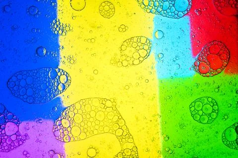 Clusters of bubbles on colorful background Stock Photos