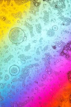 Clusters of bubbles on rainbow Stock Photos