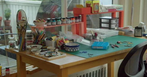 Cluttered Artist Work Desk Video stock 145180189