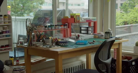 Cluttered Artist Work Desk Video stock 145180246