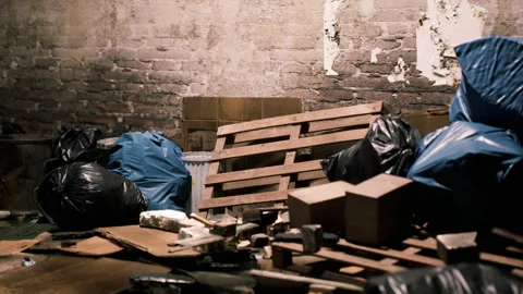 Cluttered basement with trash and old items in a run down building 動画素材 294996855