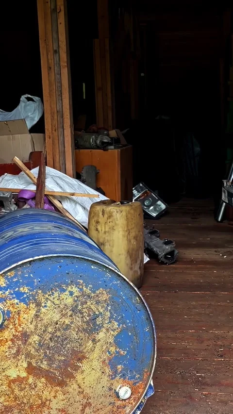 Cluttered Garage - Storage Area Filled With Debris And Waste. - vertical shot Stock Footage 337386997
