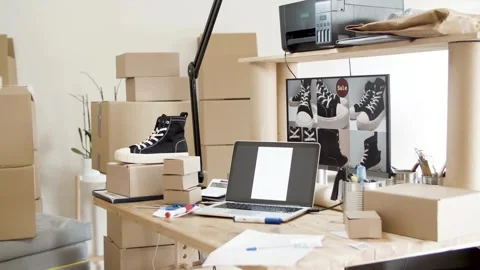 Cluttered Home Office with Boxes and Laptop 動画素材 307429716