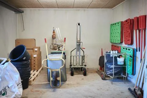 A cluttered kitchen and workshop Stock Photos