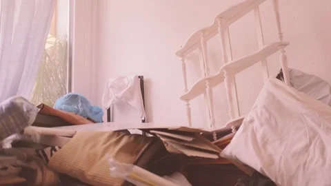 Cluttered room with piles clothes and objects, chaotic interior, hoarding d.. 스톡 동영상 334334496