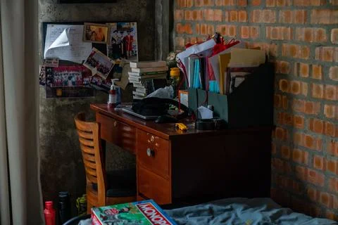 Cluttered study table Stock Photos