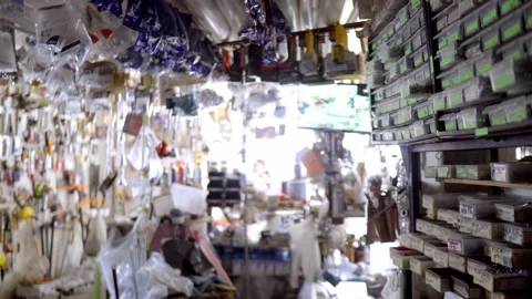 Cluttered Workshop Filled with Tools and Repair Components in Bright Lighting Stock Footage 331052010