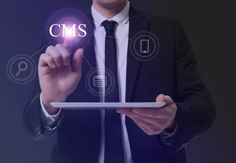 CMS. Man with tablet using virtual screen, closeup. Scheme with icons on da.. Foto stock