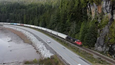 Cn Rail Eastbound empty train along the Skeena River Stock Footage 149379846