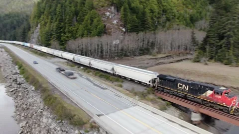 Cn Rail Eastbound empty train, engineer waving drone shot 4k footage Stock Footage 149379931
