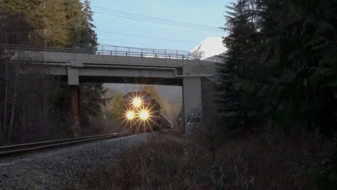 Cn rail train passing mountains through Vancouver, whistler, BC, Stock Footage 106219453