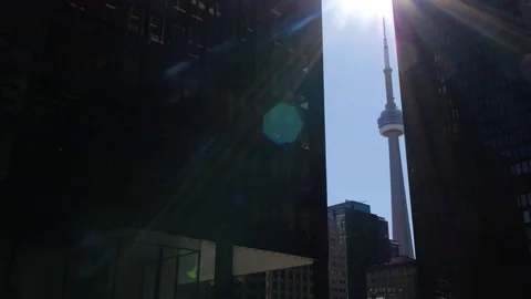 CN Tower with 2 tall downtown office buildings on sunny day 1 Stock Footage 87707900