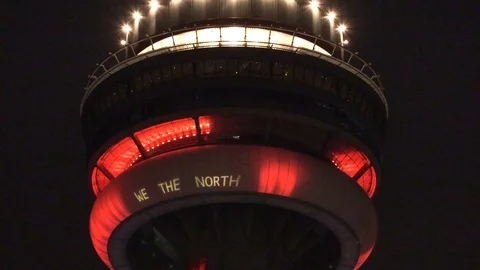 CN tower all RED in support of Toronto Raptors NBA finals historic playoffs Stock Footage 109554124