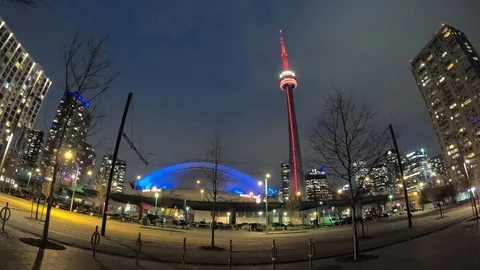 CN Tower in Red Rogers Centre in Blue with Traffic and Activities Time Lapse Stock Footage 106568431