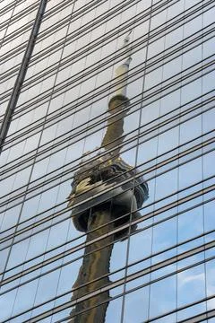 CN Tower Reflection on Glass Skyscraper in Downtown Toronto 스톡 사진
