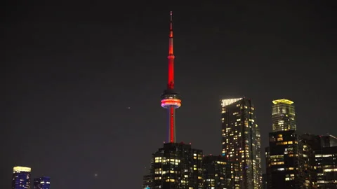 CN Tower Rises Above Toronto Skyline at Night During Lateral Camera Move Vídeo Stock 337740015