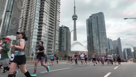 CN Tower - Runners at the Toronto Marathon in Canada. Video stock 334156887