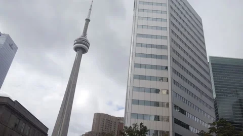 CN Tower surrounded by buildings - Toronto, Ontario, Canada Stock Footage 68999509