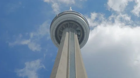 CN Tower Toronto Low Angle Tourism Closeup Blue Sky Clouds Elevator Vídeo Stock 66778977