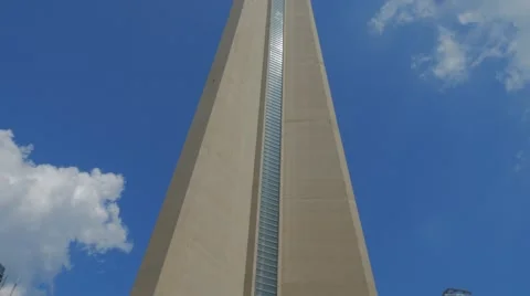 CN Tower Toronto Low Angle Tourism Closeup Blue Sky Clouds Wide Pan Up Stock-Footage 66781295