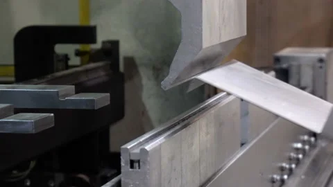 CNC bending machine. The machine bends the metal part 스톡 동영상 99147434