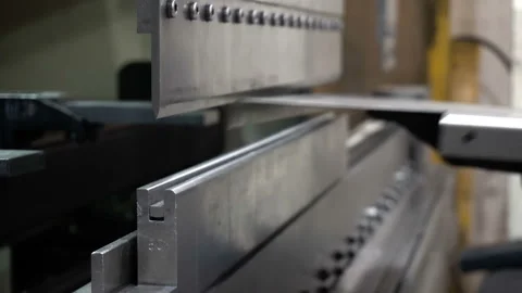 CNC bending machine. The machine bends the metal part Stock Footage 99148416