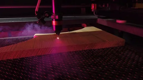 CNC burning laser woodworking processing machine working. Stock Footage 123997923