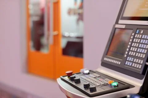 CNC control console of modern machining center Stock Photos