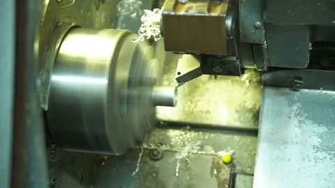 Cnc cut silver bar. ring production. metal cut in cnc. industrial machines Stock Footage 139668055