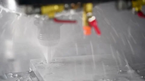 CNC drilling machine drill precisely into metal with water coolant Video stock 263853070