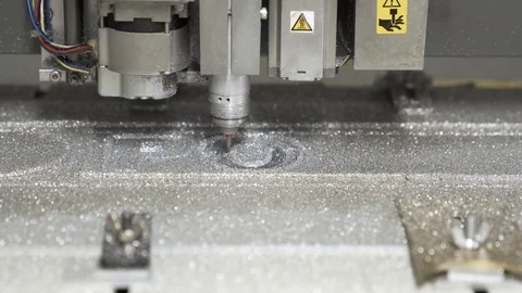 CNC engraving and cutting machine milling a metal board Stock Footage 101257996