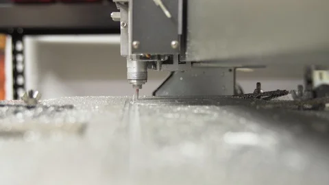 CNC engraving and cutting machine, close-up while milling a metal board Stock Footage 101258048