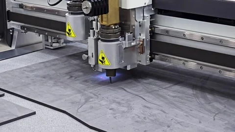 CNC Flatbed Cutting Machine Processing Industrial Material with Automated Knife Stock Footage 336435090