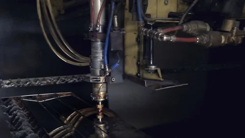 CNC Laser cutting of flat sheet metal steel material on a lathe with the program Stock Footage 103451719