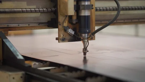 CNC Laser cutting of flat sheet metal steel material on a lathe with the program Stock Footage 129525659