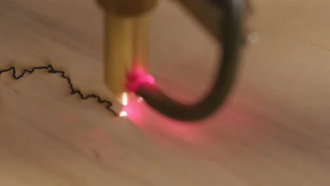 Cnc laser cutting machine cuts wooden plank and plywood Stock Footage 147123071